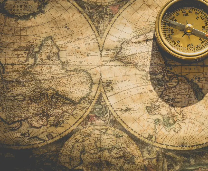 Antique world map with a compass