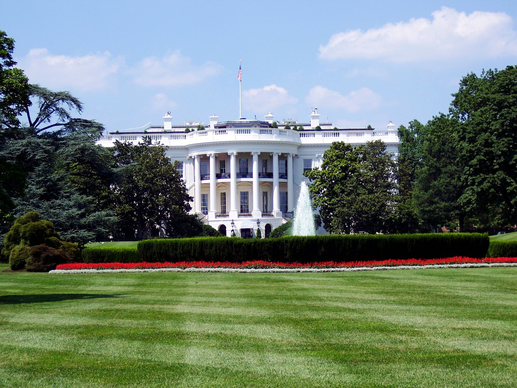 The White House in Washington, D.C., with gardens and a central fountain