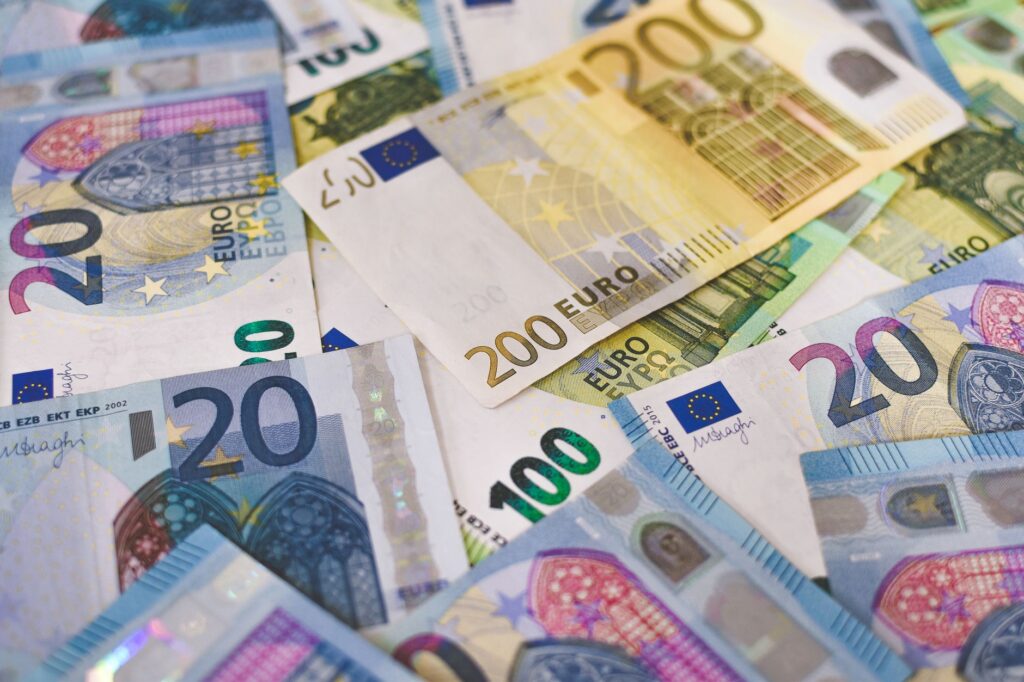 Euro banknotes scattered on a surface