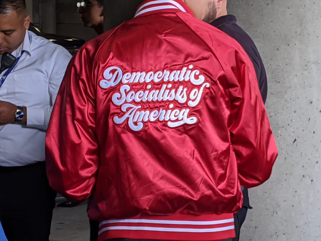 A Democratic Socialists of America jacket worn at a rally in Los Angeles, California