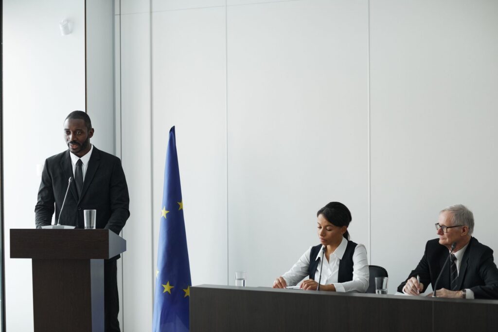 A conference room with a European Union flag