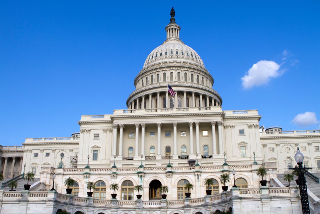 The United States Capitol building in Washington, D.C. under a clear sky