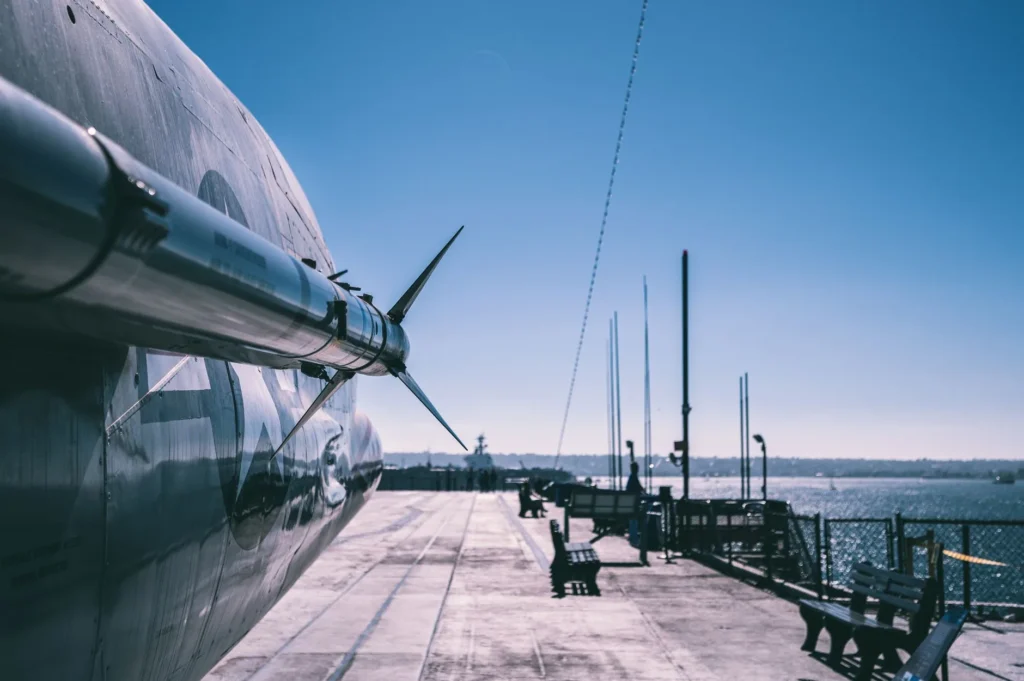 Missile-equipped aircraft on a naval ship deck