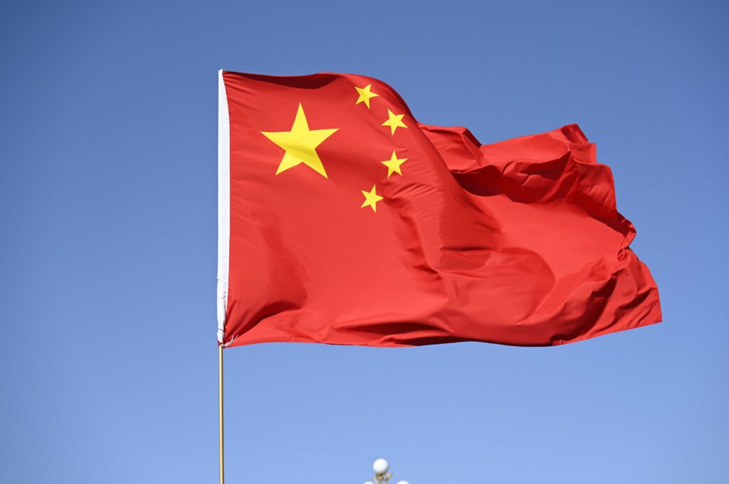 Chinese national flag against a clear sky